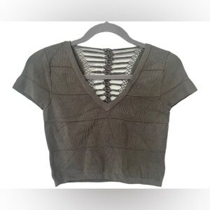 Bebe Vintage Seatbelt Crop Top- Olive Green
Open Crochet Back Bandage
Size Small